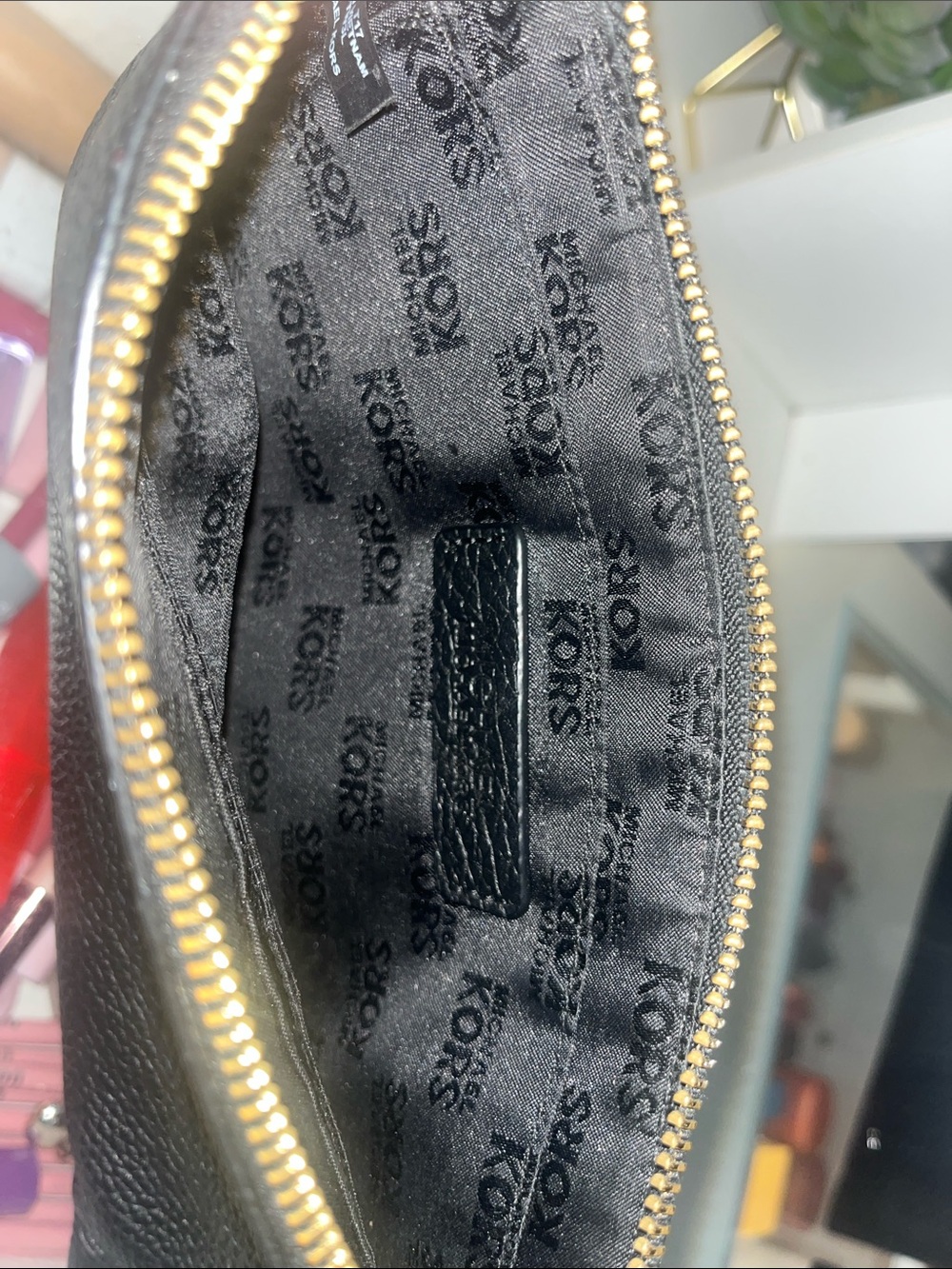 Michael Kors Black Pebbled Leather Wristlet with Gold Emblem - Picture 3 of 3